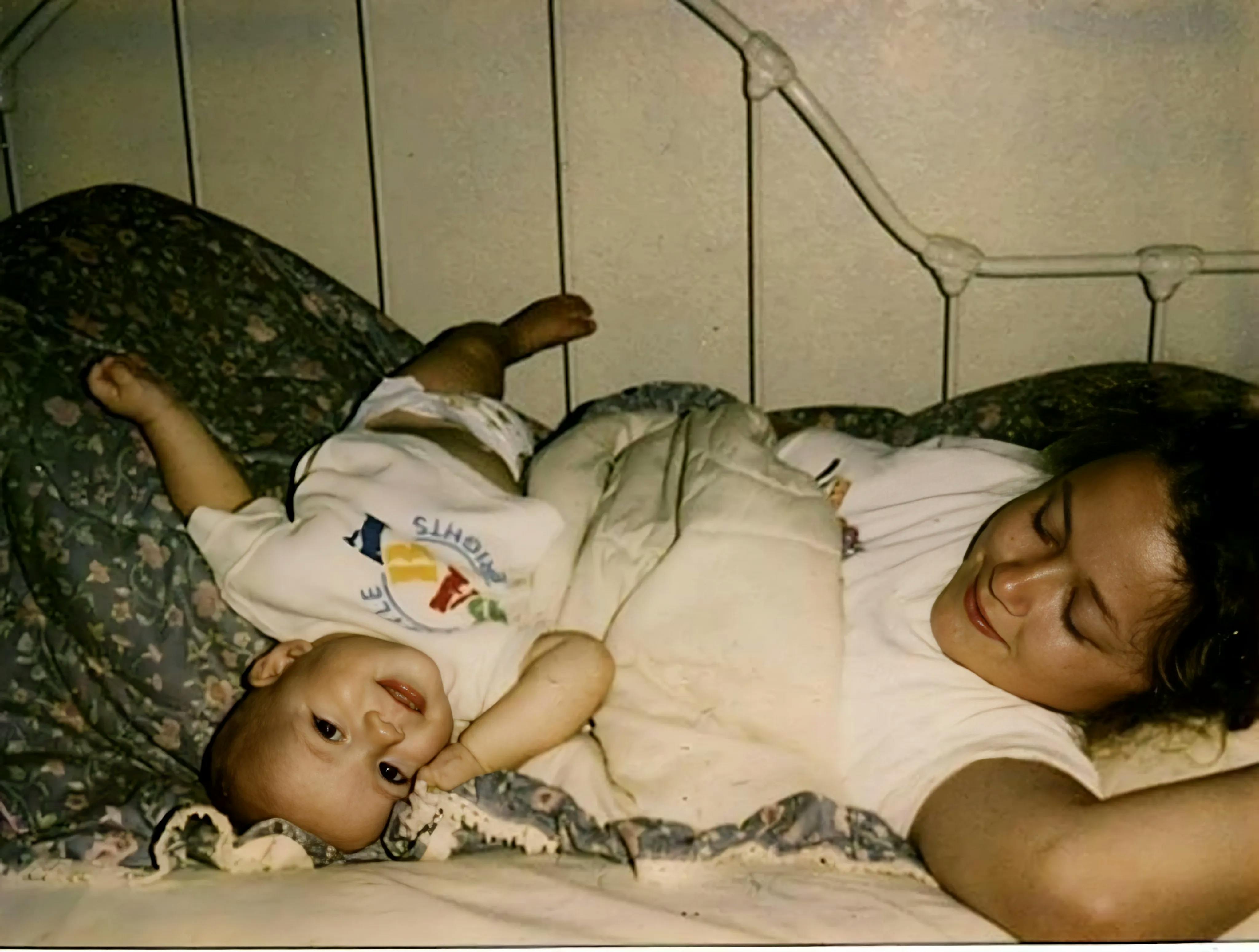 Chris as a baby with his mother